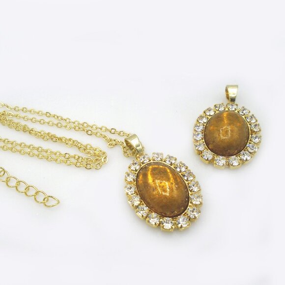 GORGEOUS SHIMMERING RESIN TOPAZ in Swarovski Crystal Oval Setting - Picture 1 of 2